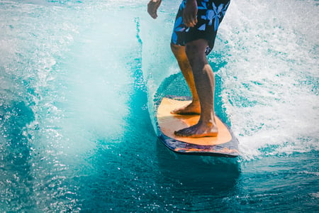 A surfer, steady on his feet